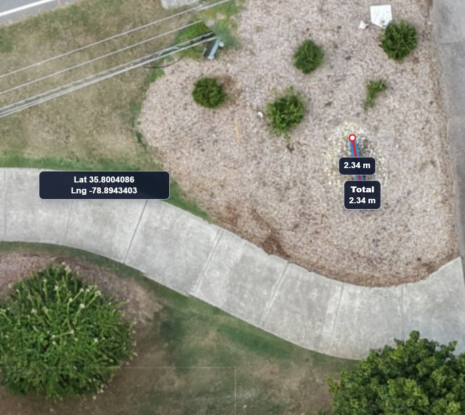Test 2 before AerialAlign showing coordinate 35.8004086, -78.8943403, 1.5 meter coordinate error, and 2.34 meter measured length